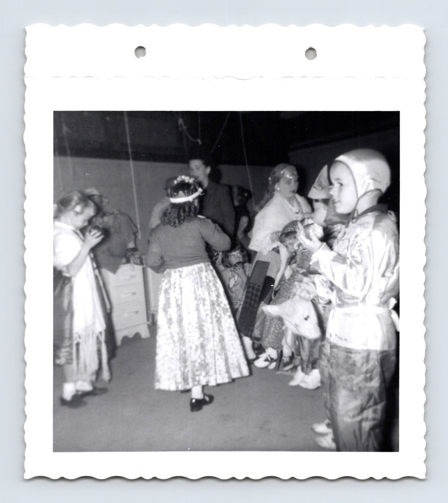 Children Halloween costume party dancing indoors mid century snapshot 1960s photo