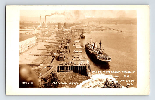 Weyerhaeuser Timber Company dock Longview Washington 1940 real photo postcard with cargo ship and mill smokestacks