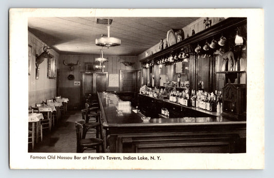 Indian Lake New York Farrells Tavern Old Nassau Bar interior 1940s photo showing long wooden bar with stools and back bar bottles