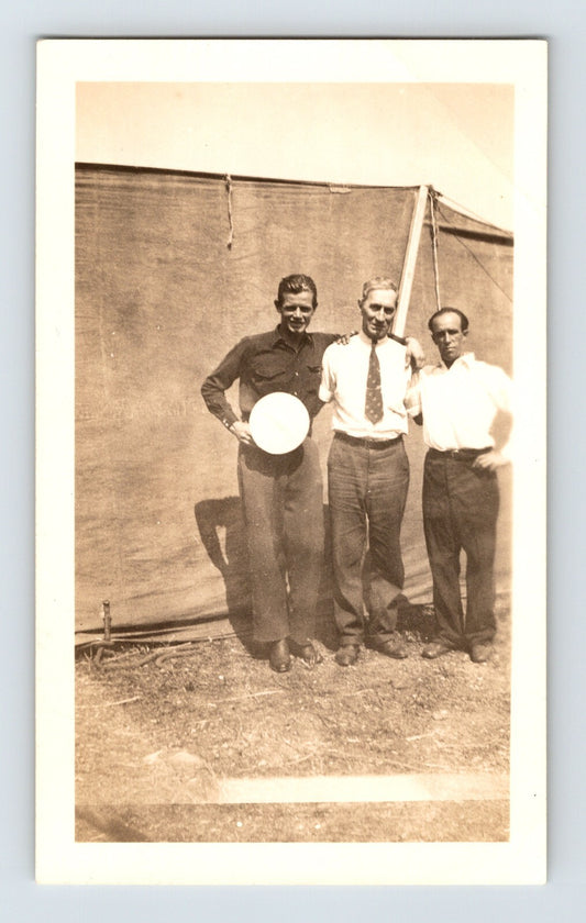 Clyde Beatty Circus 1945 photo three performers trainers standing tent backdrop vintage snapshot