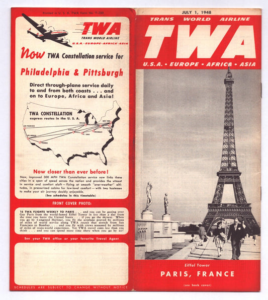 1948 TWA Trans World Airlines system timetable brochure featuring Eiffel Tower in Paris and Constellation service promotion panel for U.S., Europe, Africa, and Asia routes.