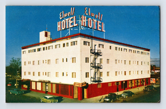 Las Vegas Nevada Elwell Hotel 1960s roadside hotel exterior neon rooftop sign chrome postcard