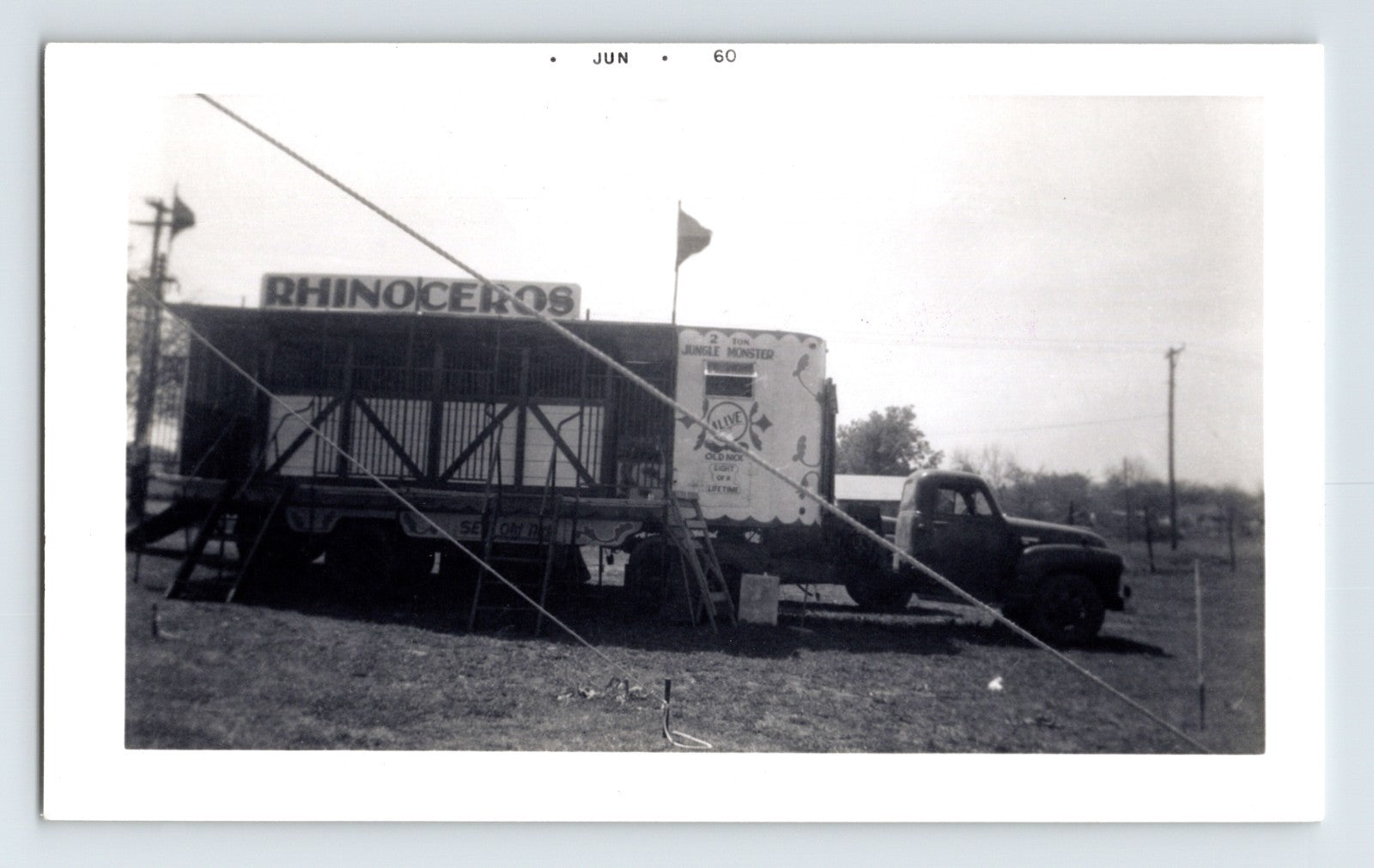 Cole Circus 1960 rhinoceros wagon cage truck Hugo Oklahoma roadside setup photo