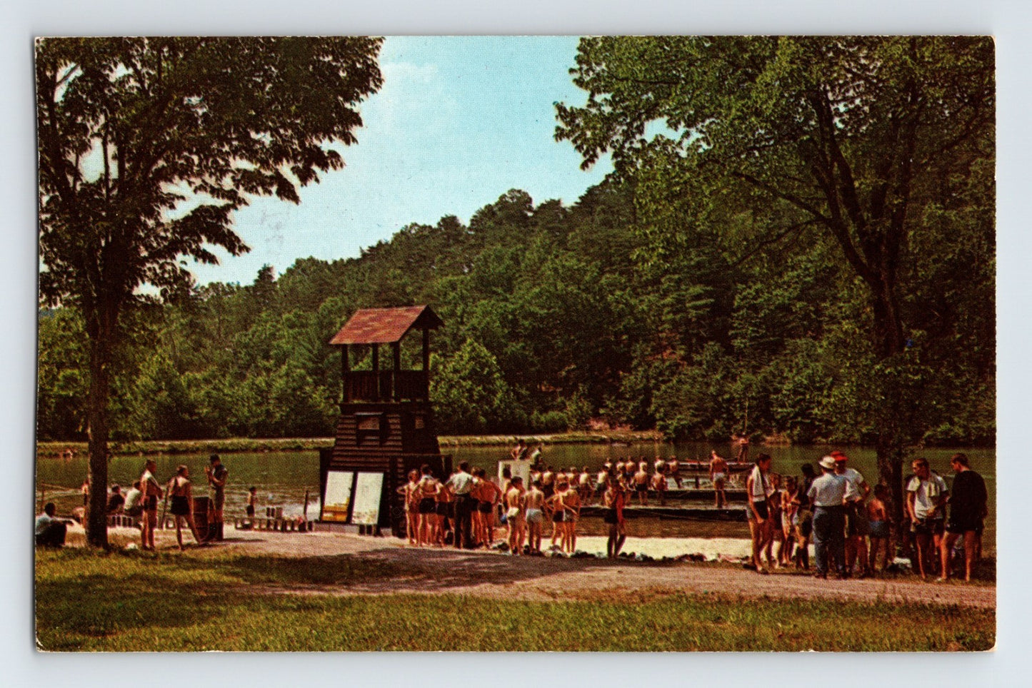Boy Scouts gathered at Miller Lake swimming area with wooden lifeguard tower in Gore, Virginia, 1960s chrome postcard.