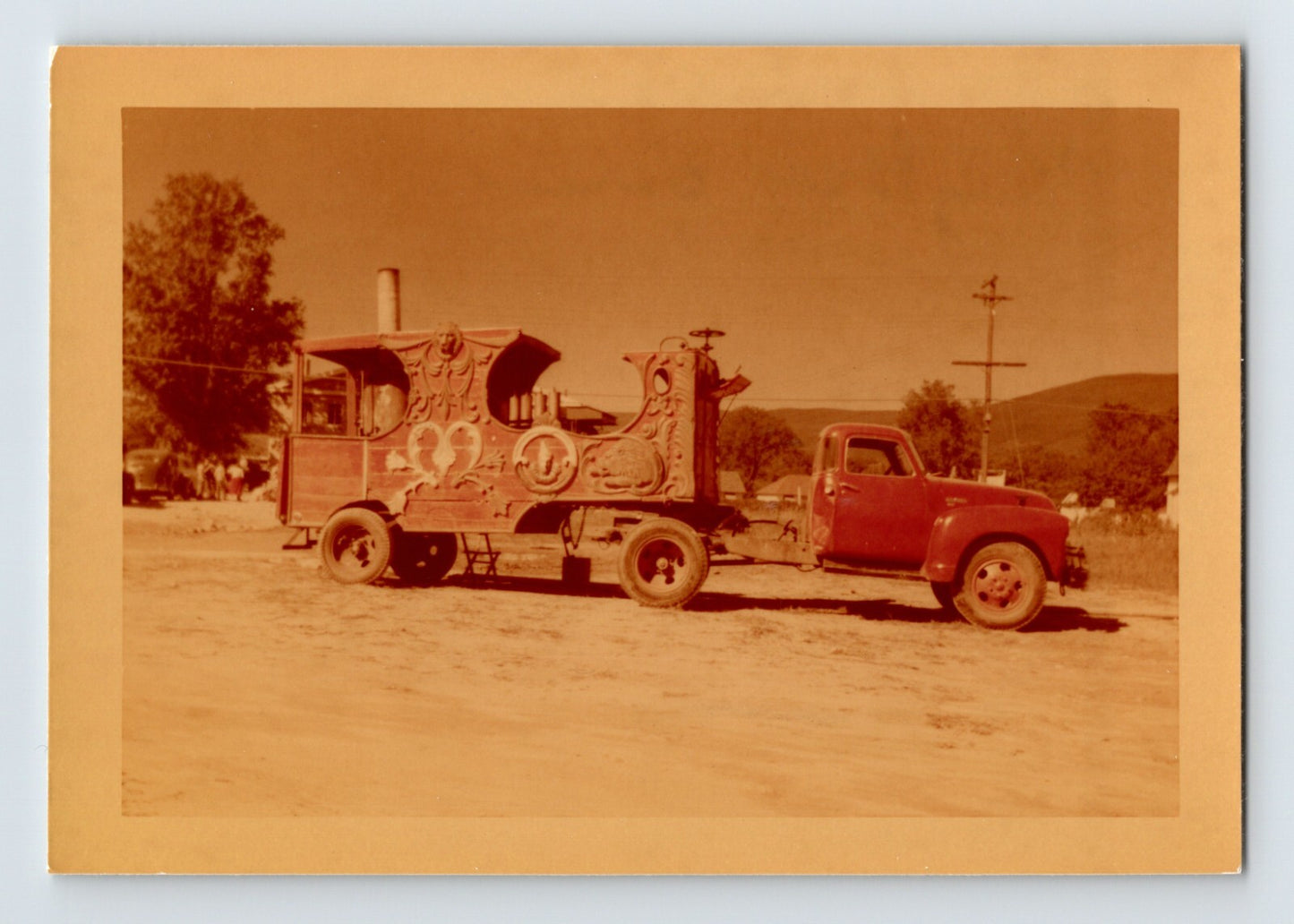 King Bros Circus steam calliope truck 1952 with decorative carved wagon body mounted on red pickup chassis