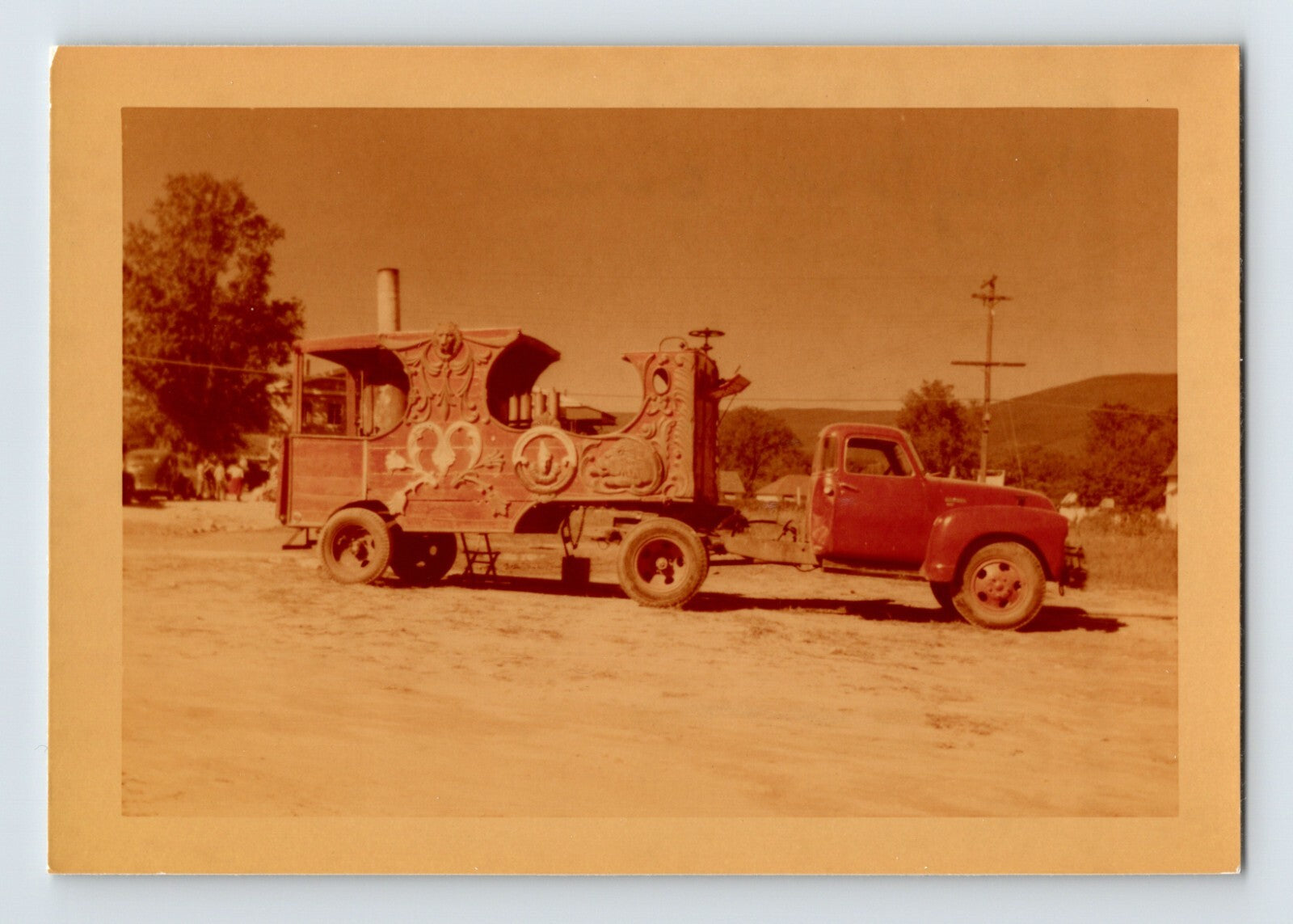King Bros Circus steam calliope truck 1952 with decorative carved wagon body mounted on red pickup chassis