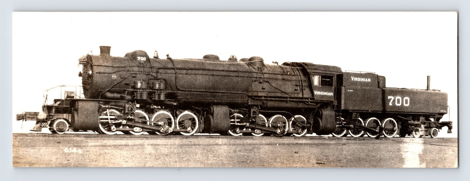 Virginian Railroad 2-8-8-8-4 steam locomotive number 700 1940s photo side profile on track