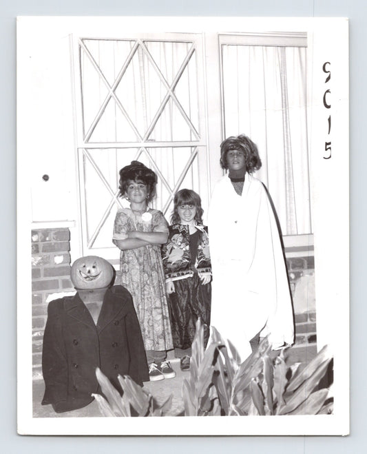 Children Halloween costumes porch jack o lantern figure ghost outfit group 1960s snapshot photo 5 x 4