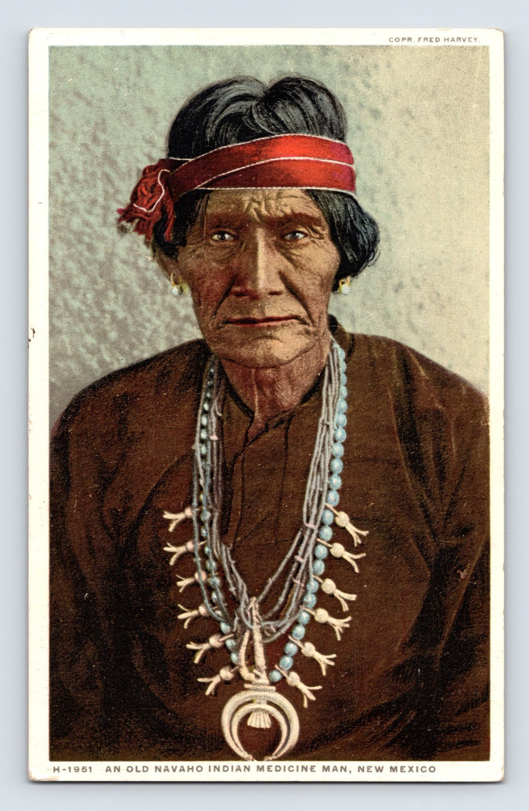 New Mexico Navajo medicine man portrait with red headband and turquoise necklace 1910s postcard
