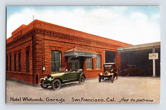 Hotel Whitcomb Garage building with early automobiles parked outside in San Francisco, California, 1910s postcard.