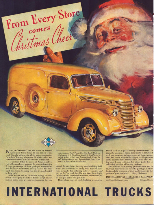Santa holding Christmas cheer sign behind yellow International delivery truck 1938 holiday print advertisement