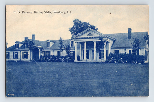 H B Duryea Racing Stable Westbury Long Island New York 1910s blue-toned postcard showing columned stable building and grounds