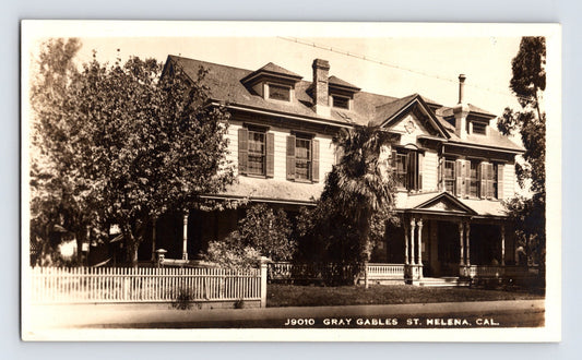 Real photo postcard of Gray Gables Inn in St Helena California showing large Victorian style hotel with white picket fence, 1940s