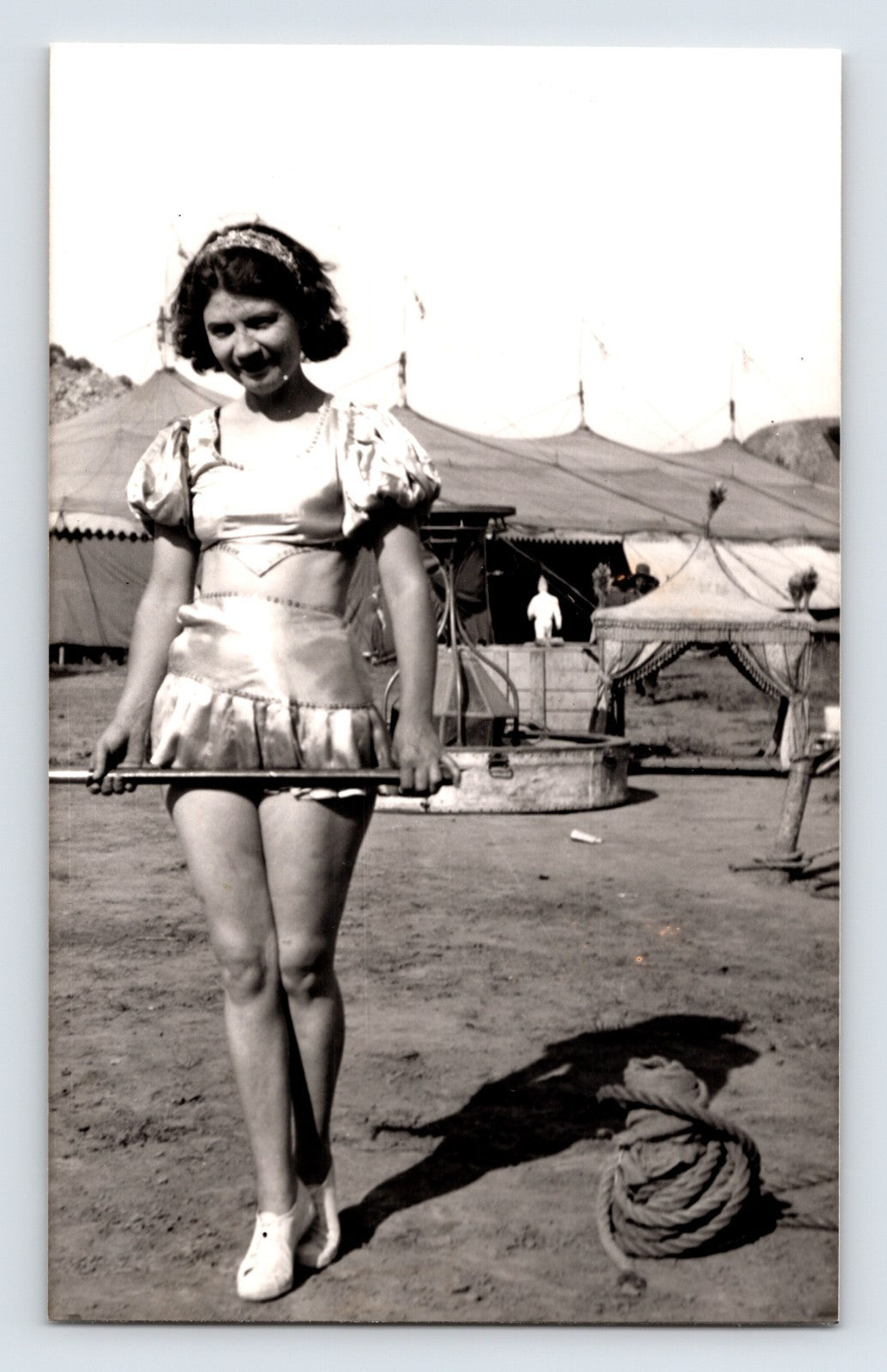 Barnes Sells Floto Circus showgirl performer balancing rod circus grounds tents 1940s photograph