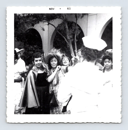 Vintage Halloween party children costumes courtyard arches 1960 snapshot black white photo