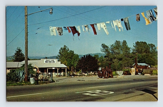 Angels Camp California museum roadside display clothesline antiques chrome postcard 1960s
