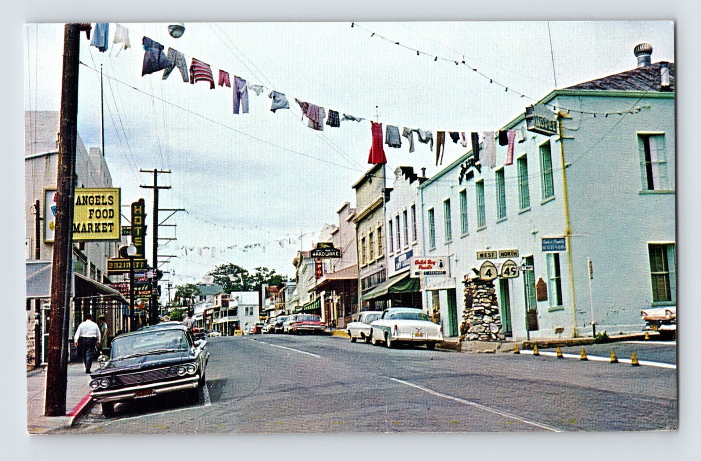Angels Camp California downtown street view market laundry storefronts 1960s chrome postcard cars signage