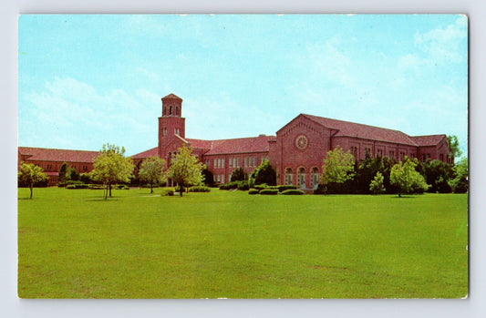 1960s Wichita Falls Texas Midwestern State College postcard showing red brick campus building with tower and wide green lawn