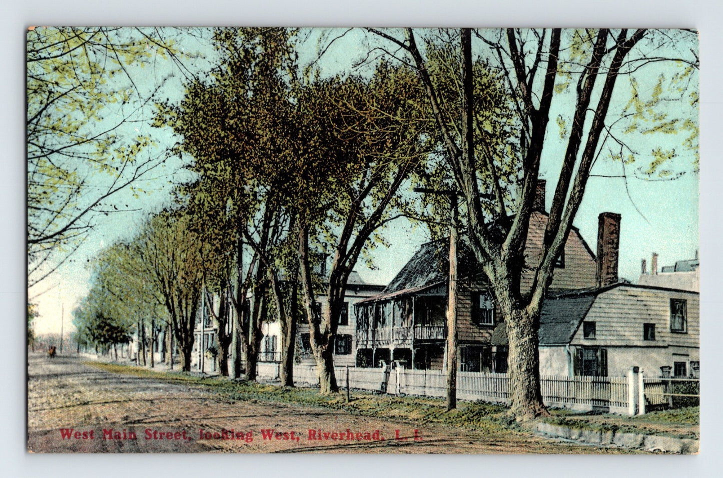 West Main Street looking east Riverhead Long Island New York 1910s divided back postcard with tree lined street and houses