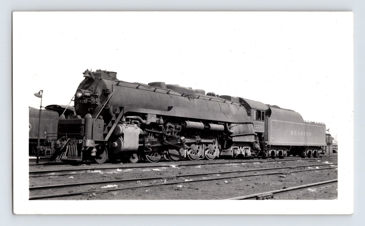 Black and white photograph of Reading Railroad 4-8-4 steam locomotive at Communipaw New Jersey 1949