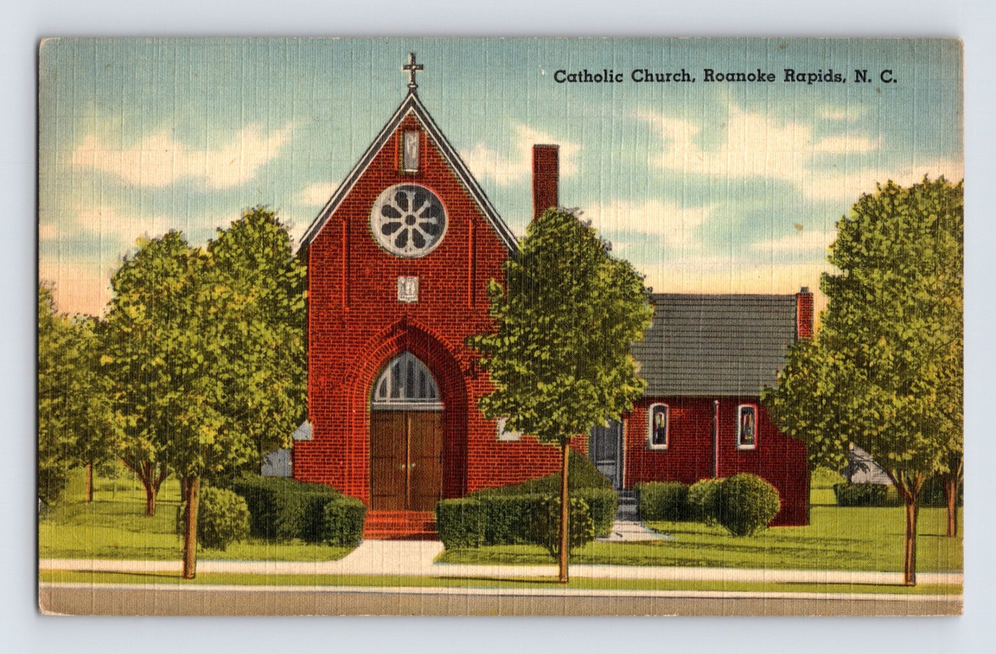 Roanoke Rapids North Carolina Catholic Church 1943 linen postcard with red brick church and landscaped grounds