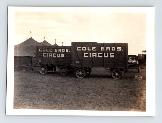 Cole Bros Circus wagons with lettering parked beside big top tents Wichita Kansas 1946
