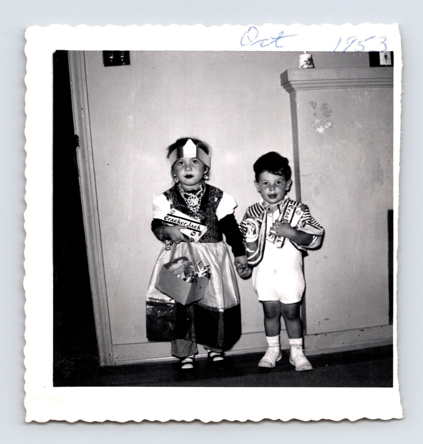 Vintage Halloween children costumes trick or treat Cracker Jack candy 1953 snapshot black white photo