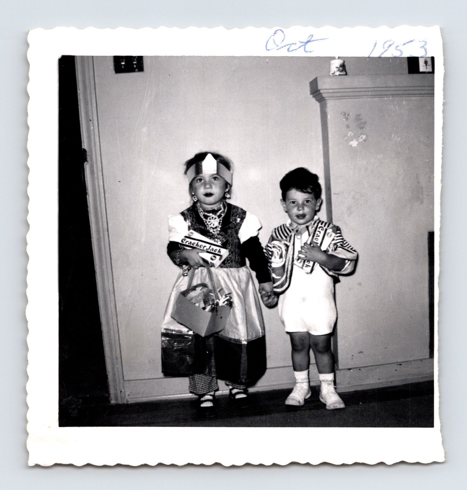 Vintage Halloween children costumes trick or treat Cracker Jack candy 1953 snapshot black white photo