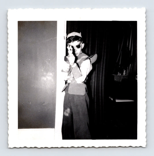 1963 boy costume toy gun cowboy space ranger indoor snapshot square photo Evanston Illinois