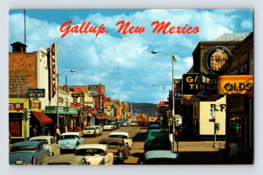 Gallup New Mexico Coal Avenue downtown street scene 1963 chrome postcard with classic cars storefront signs and roadside commercial buildings