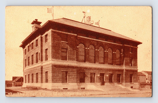 1920s Eureka California Federal Building sepia postcard showing multi story government building with arched windows and formal façade