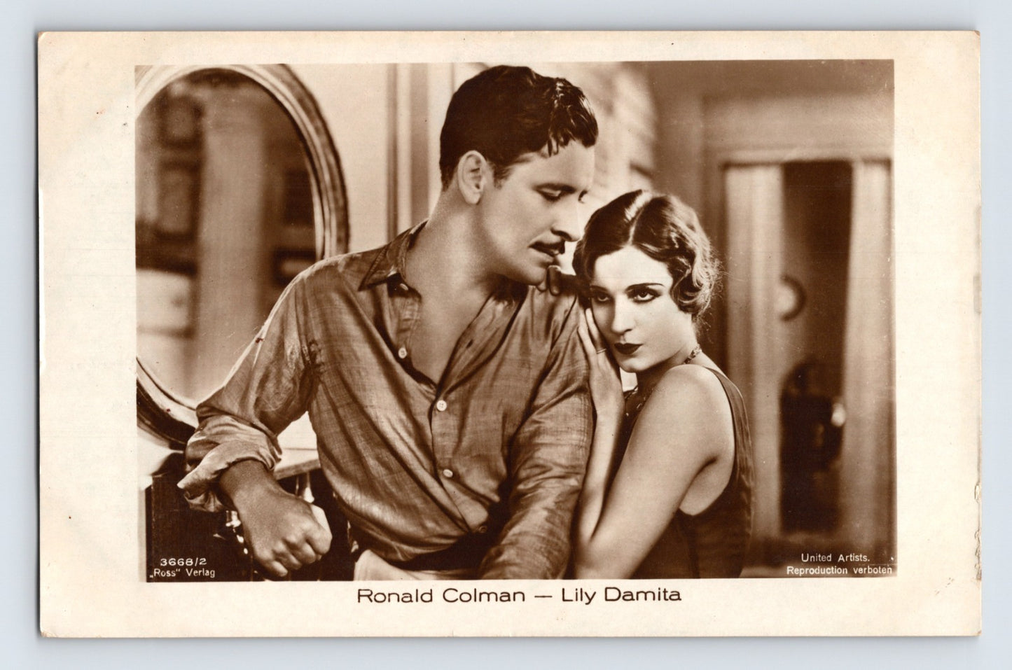 Ronald Colman Lily Damita interior scene mirror Ross Verlag 1930s RPPC postcard