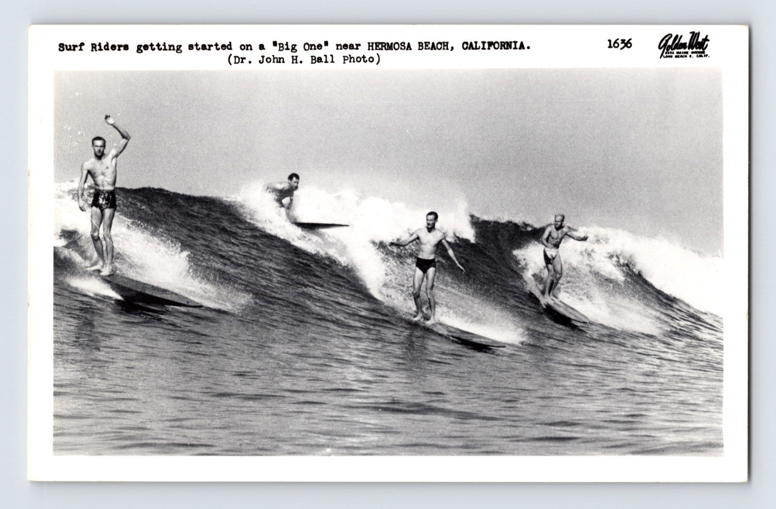 Hermosa Beach California surfers riding large ocean waves in vintage surfing postcard photograph