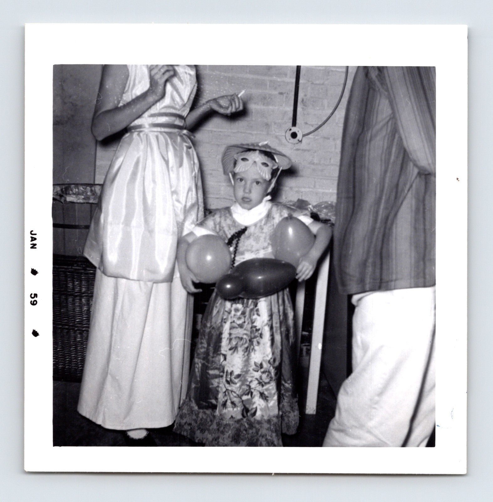 Vintage Halloween girl costume balloons mask hat 1959 snapshot black white photo party scene