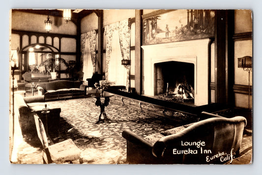 Eureka California Eureka Inn lounge interior RPPC postcard with fireplace seating area and hotel furnishings