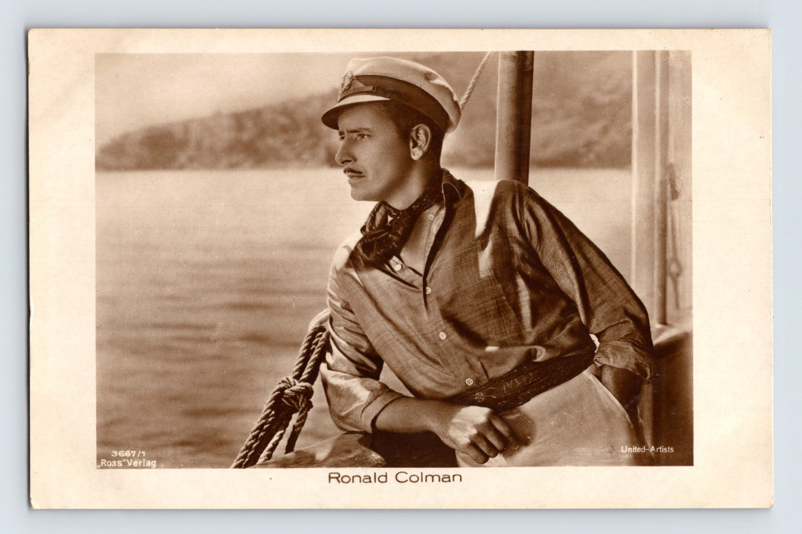 Ronald Colman portrait on boat deck 1930s Ross Verlag film star postcard