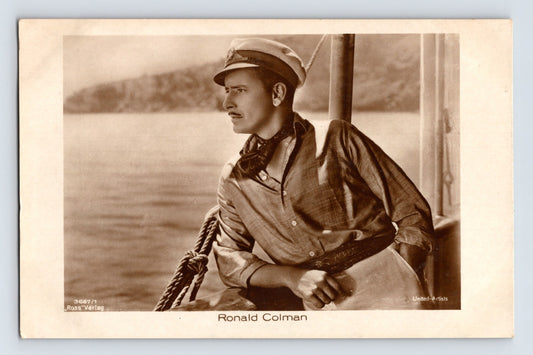 Ronald Colman portrait on boat deck 1930s Ross Verlag film star postcard