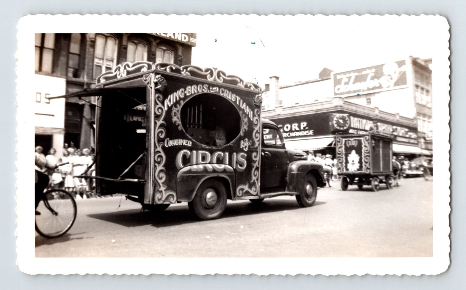 King Bros and Cristiani Circus parade trucks Burlington Vermont 1952 street scene