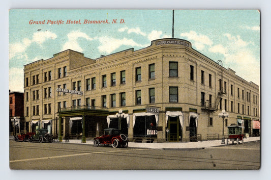 Bismarck North Dakota Grand Pacific Hotel street corner view with early automobiles 1916 postcard