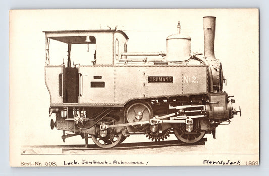 1910s real photo postcard showing the Hermann No. 2 cog railroad steam locomotive of the Jenbach-Achensee Railway in Austria in a studio-style side profile view.