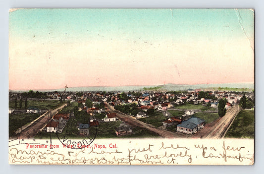 Napa California panoramic postcard view from the water tower showing residential streets, scattered homes, and the early Napa Valley landscape.