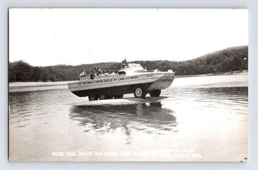 Wisconsin Dells duck boat amphibious tour vehicle entering water RPPC 1950s