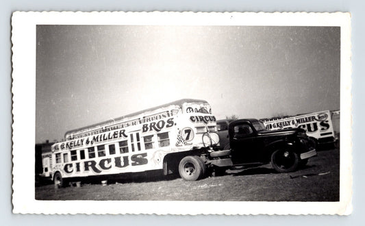 Kelly Miller Circus 1950 band sleeper trailer Hugo Oklahoma photograph showing painted circus bus and tow vehicle