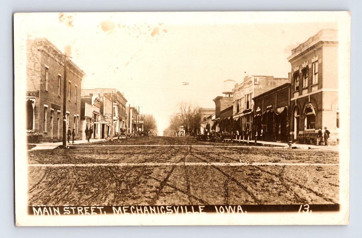 Mechanicsville Iowa Main Street Downtown 1911 real photo postcard posted Kruxo paper back