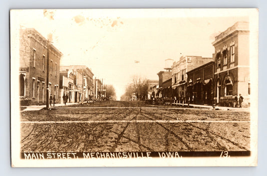 Mechanicsville Iowa Main Street Downtown 1911 real photo postcard posted Kruxo paper back