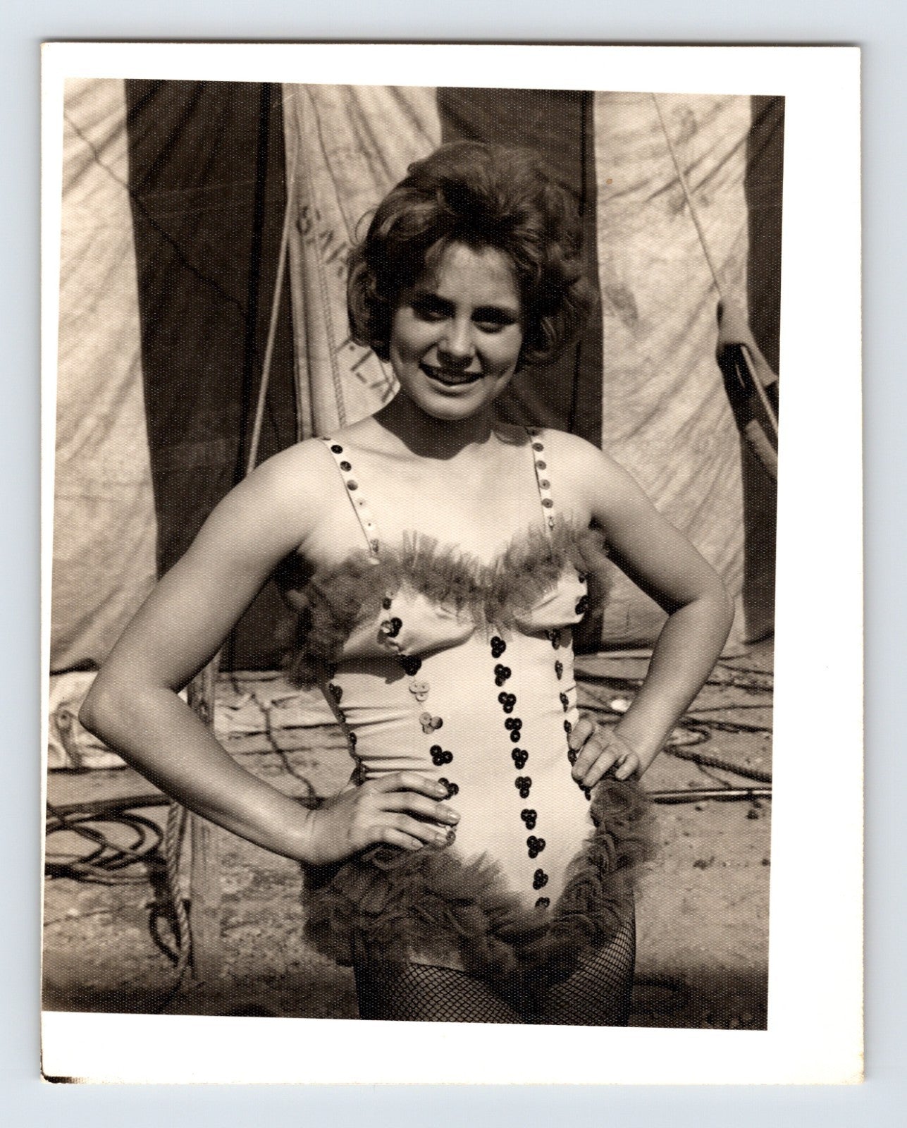 Mills Bros Circus showgirl performer posing in costume beside big top canvas 1964 backstage photograph