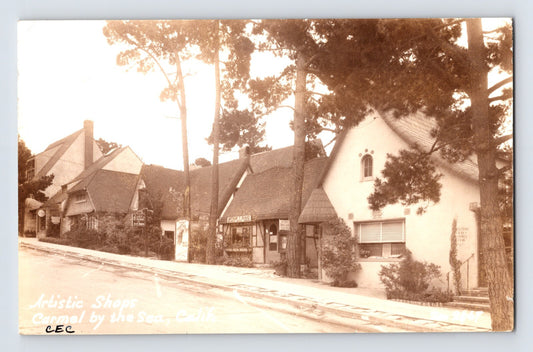 Carmel California Art Studio District shops exterior view 1942 RPPC postcard by Zan Stark posted
