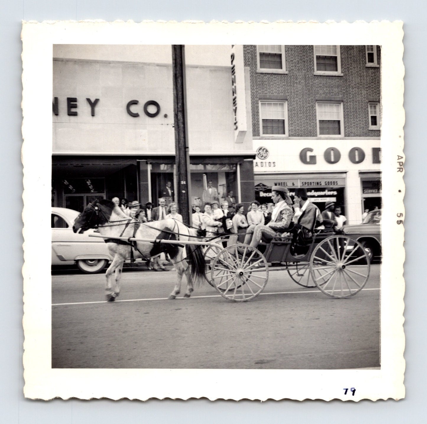1955 Cole Bros Circus horse carriage parade snapshot photograph showing performers riding through downtown Decatur GA streets during a circus procession