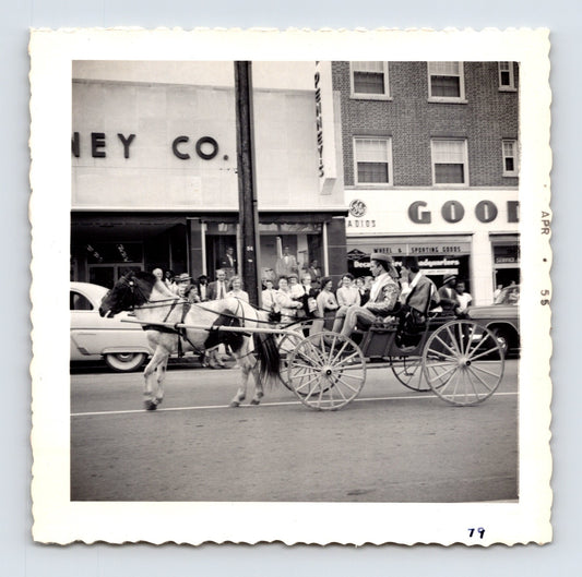 1955 Cole Bros Circus horse carriage parade snapshot photograph showing performers riding through downtown Decatur GA streets during a circus procession