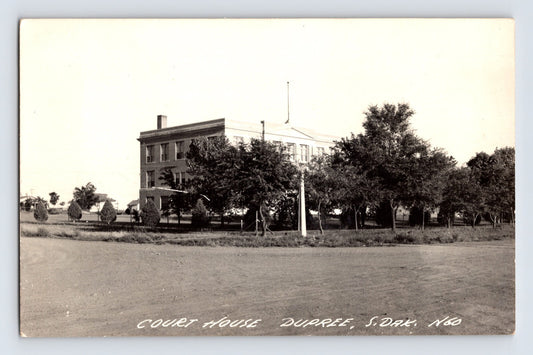 Dupree South Dakota courthouse photo 1940s showing two story government building with trees and open foreground
